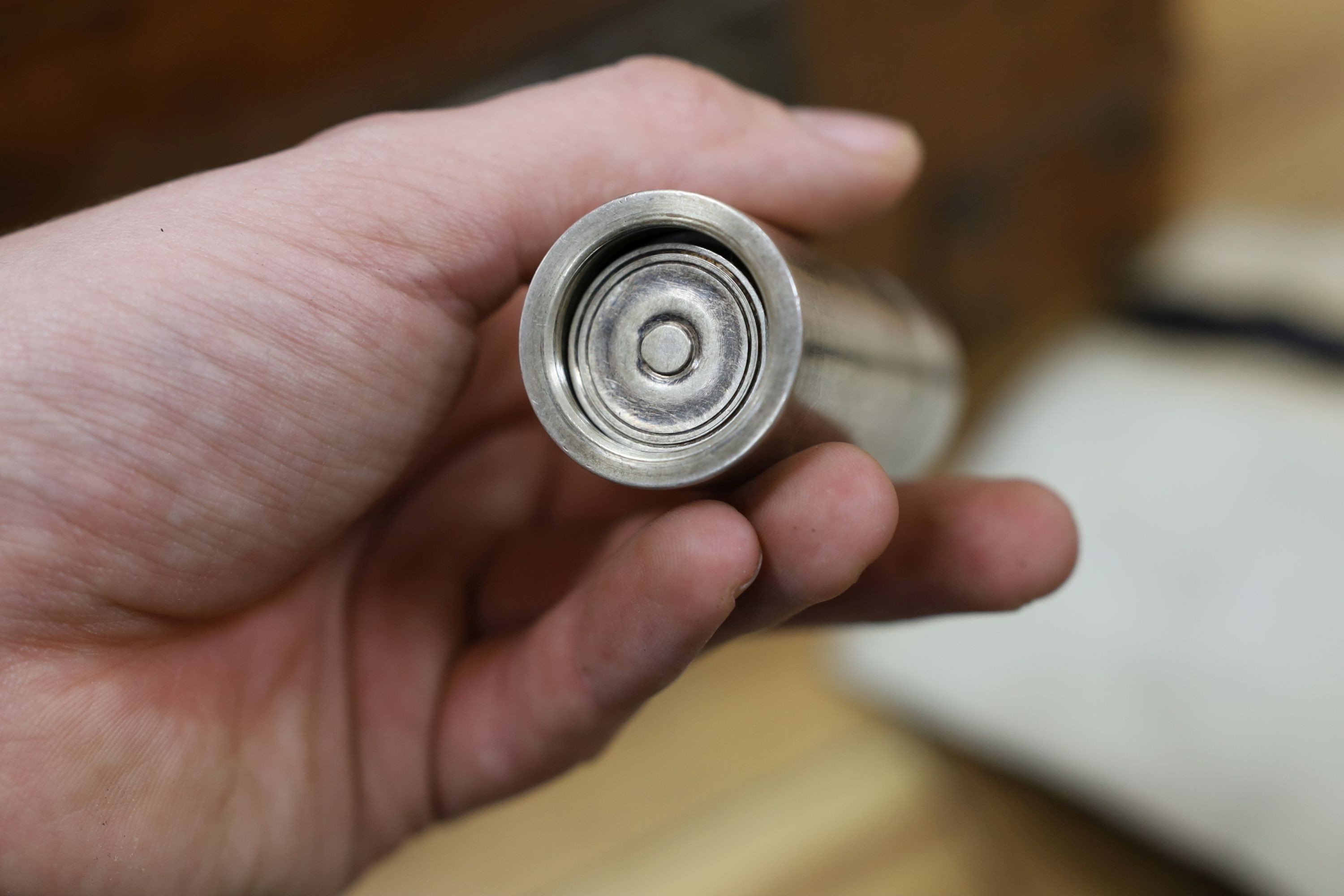 A Dupont travel suitcase, initialled ‘L.C.’ with French white metal mounted bottles